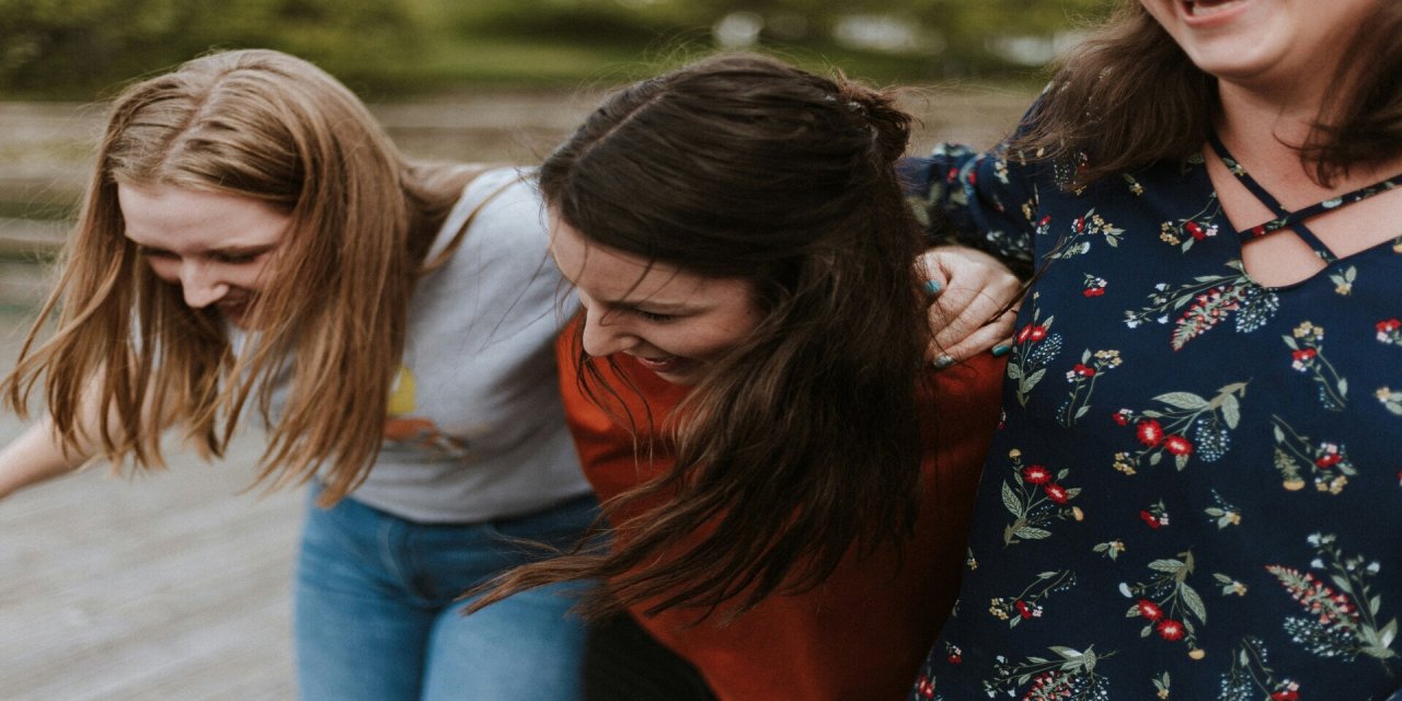 Group of friends hugging